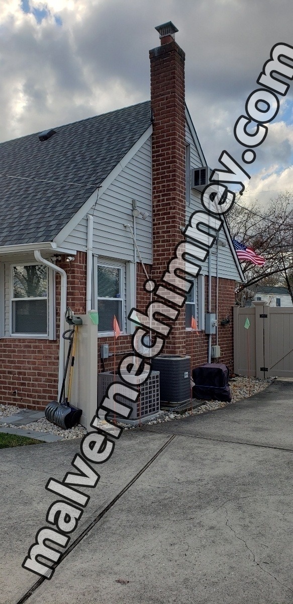 Professional chimney repointing restoring brick joints in Malverne, NY
