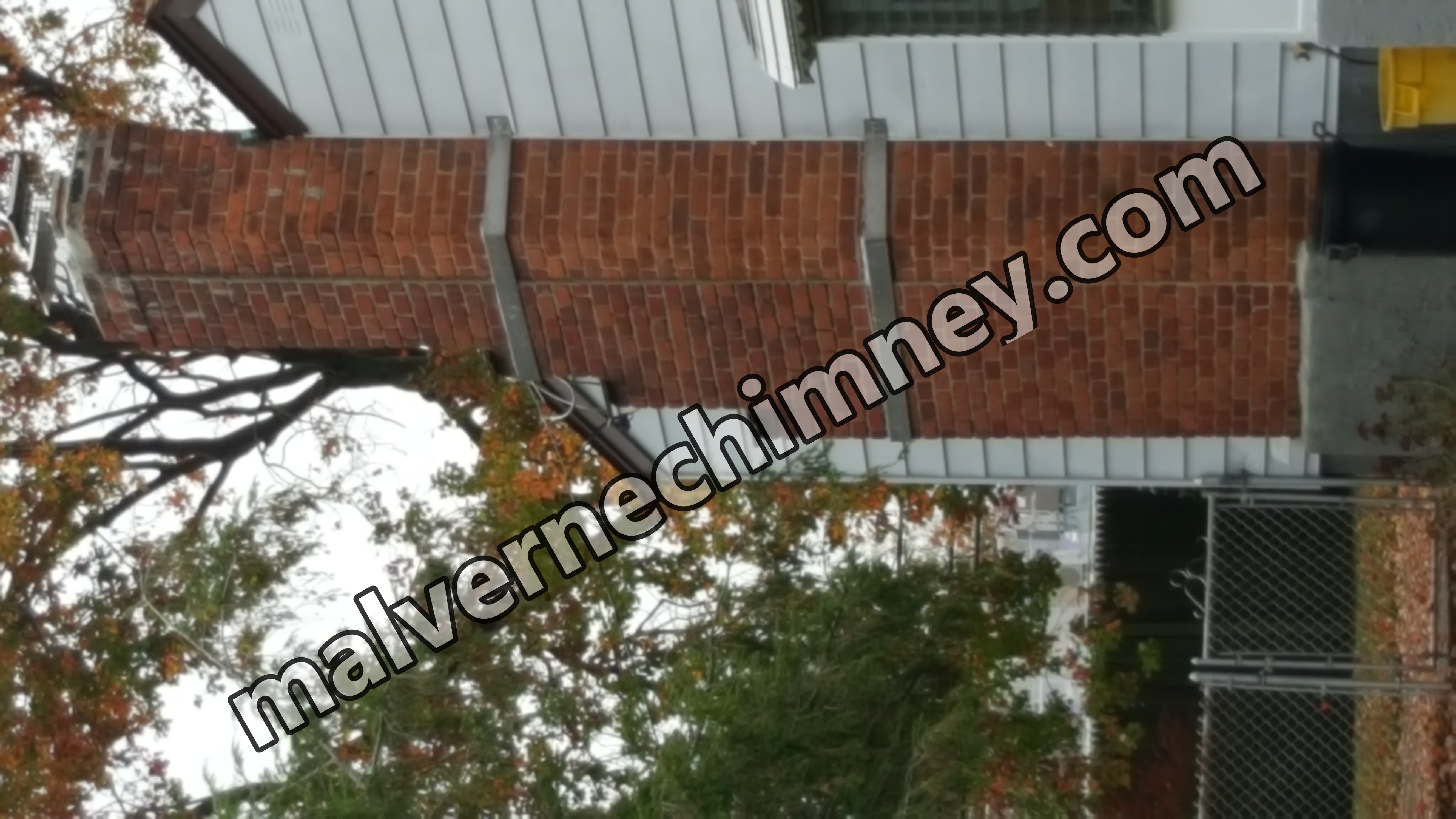 Heavy oil soot removal from chimney flue in Malverne, New York