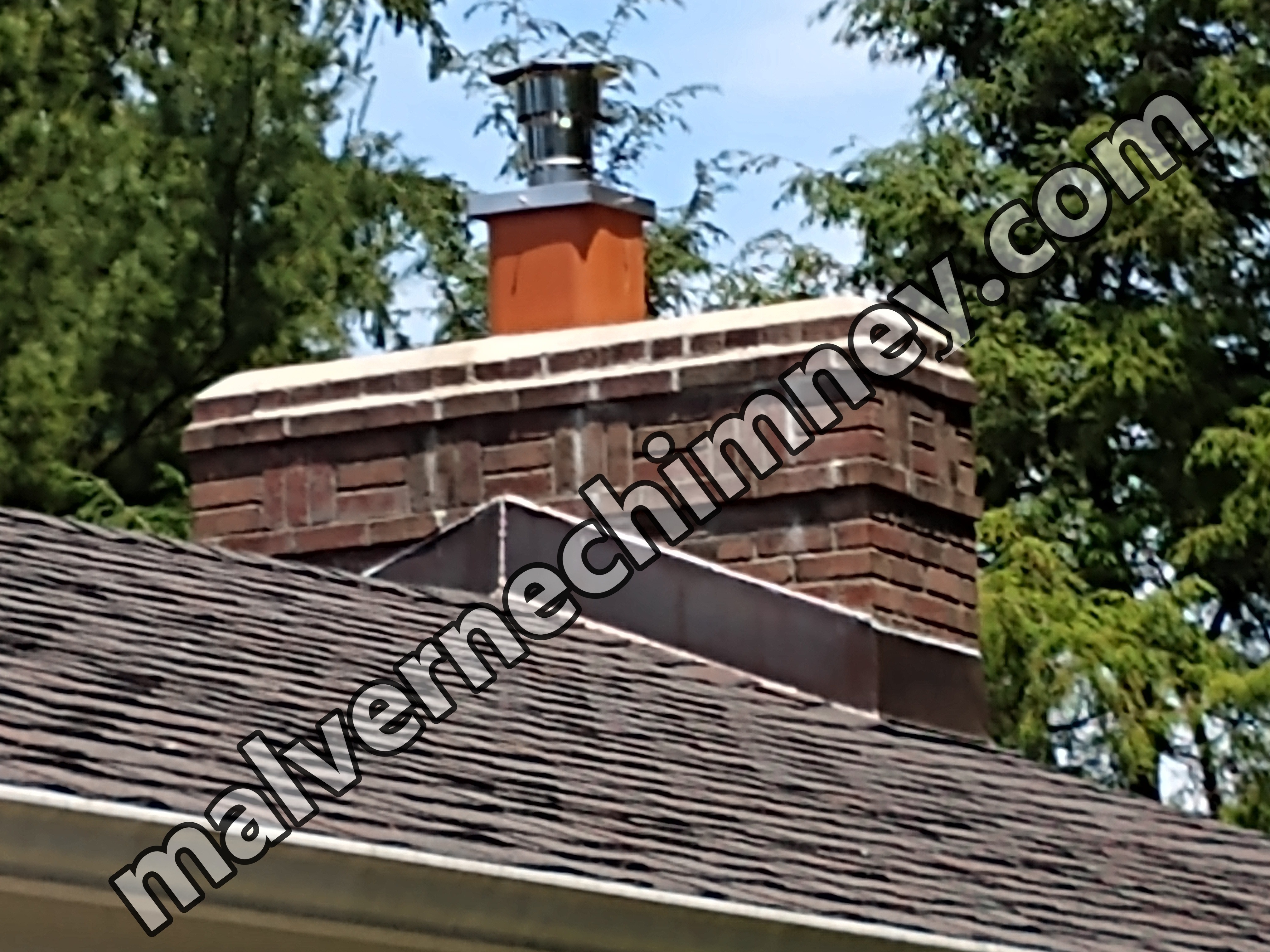 Stainless steel chimney cap with animal guard in Malverne, New York